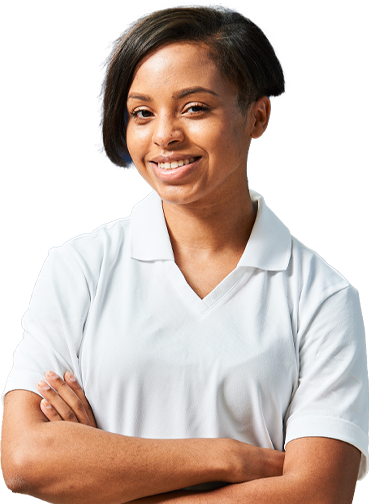 Smiling worker with her arms crossed.